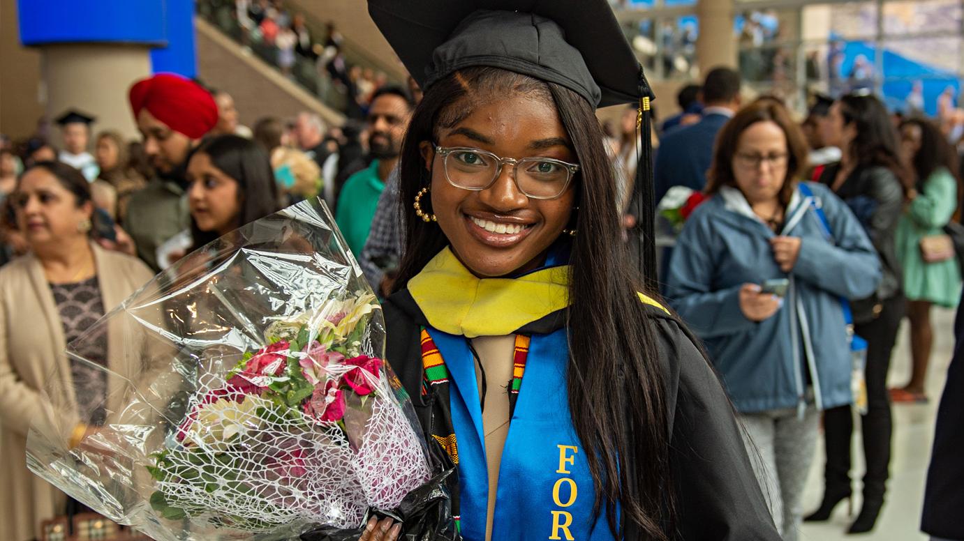 Student graduating with honors